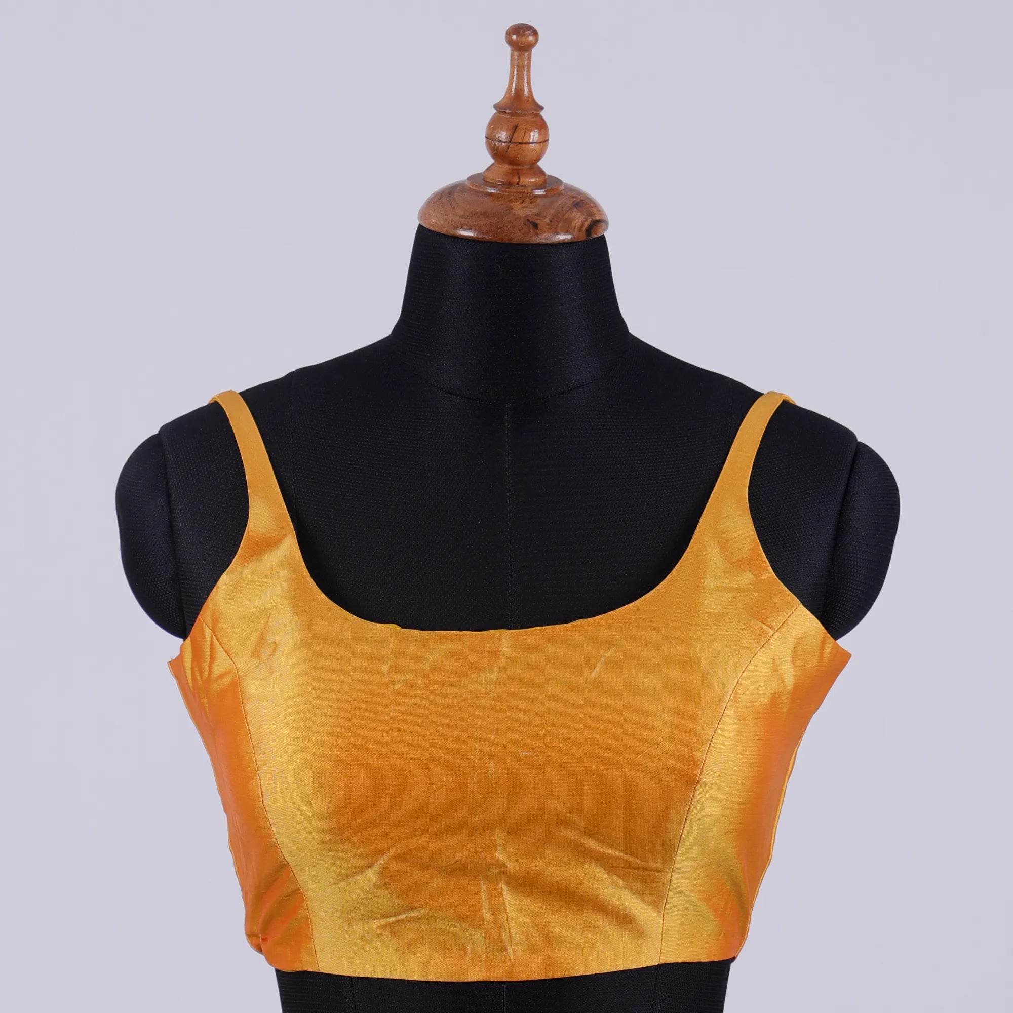 Golden Sleeveless Blouse with Round Neck - Adi Akshoy & Co.
