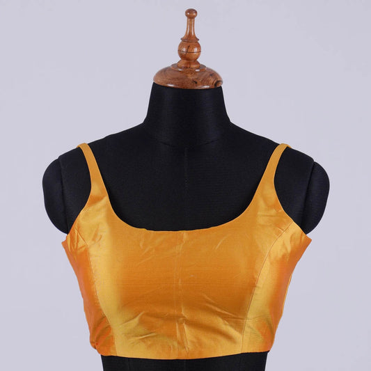 Golden Sleeveless Blouse with Round Neck - Adi Akshoy & Co.
