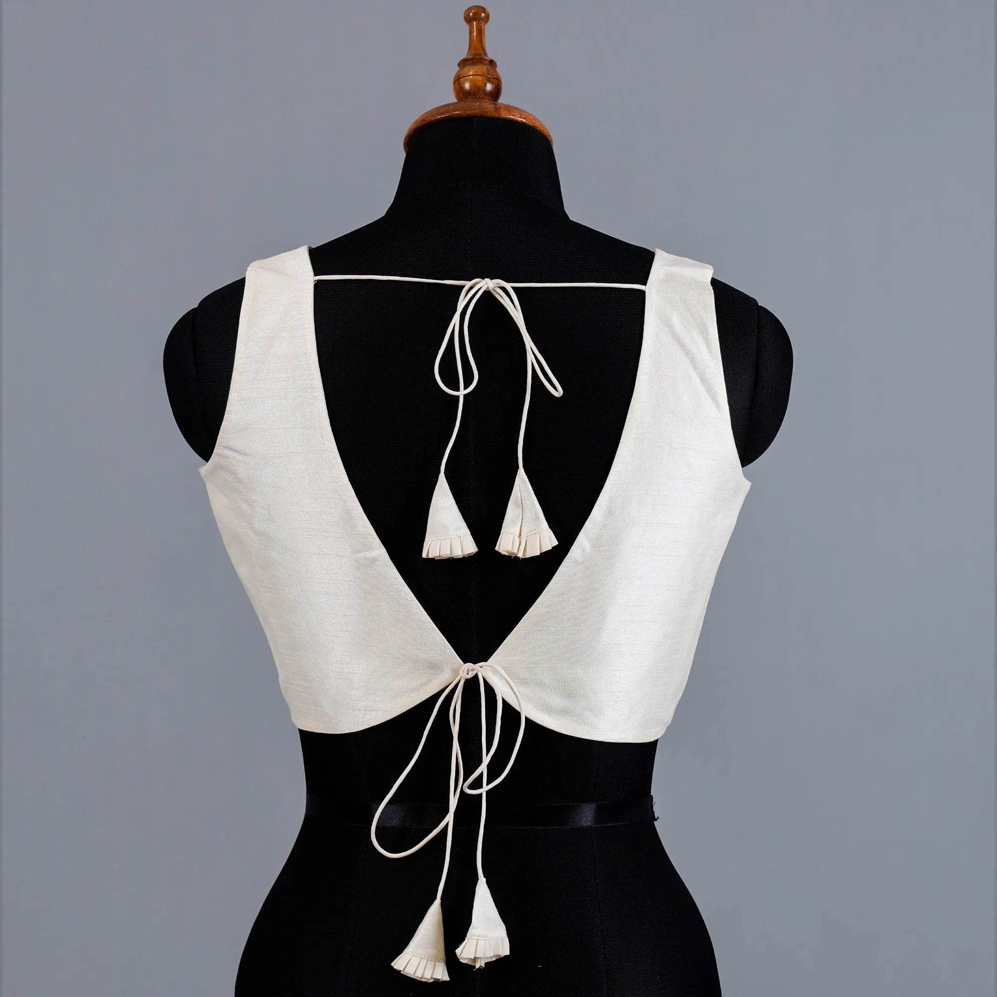 White Sleeveless Blouse with V-Neck - Adi Akshoy & Co.