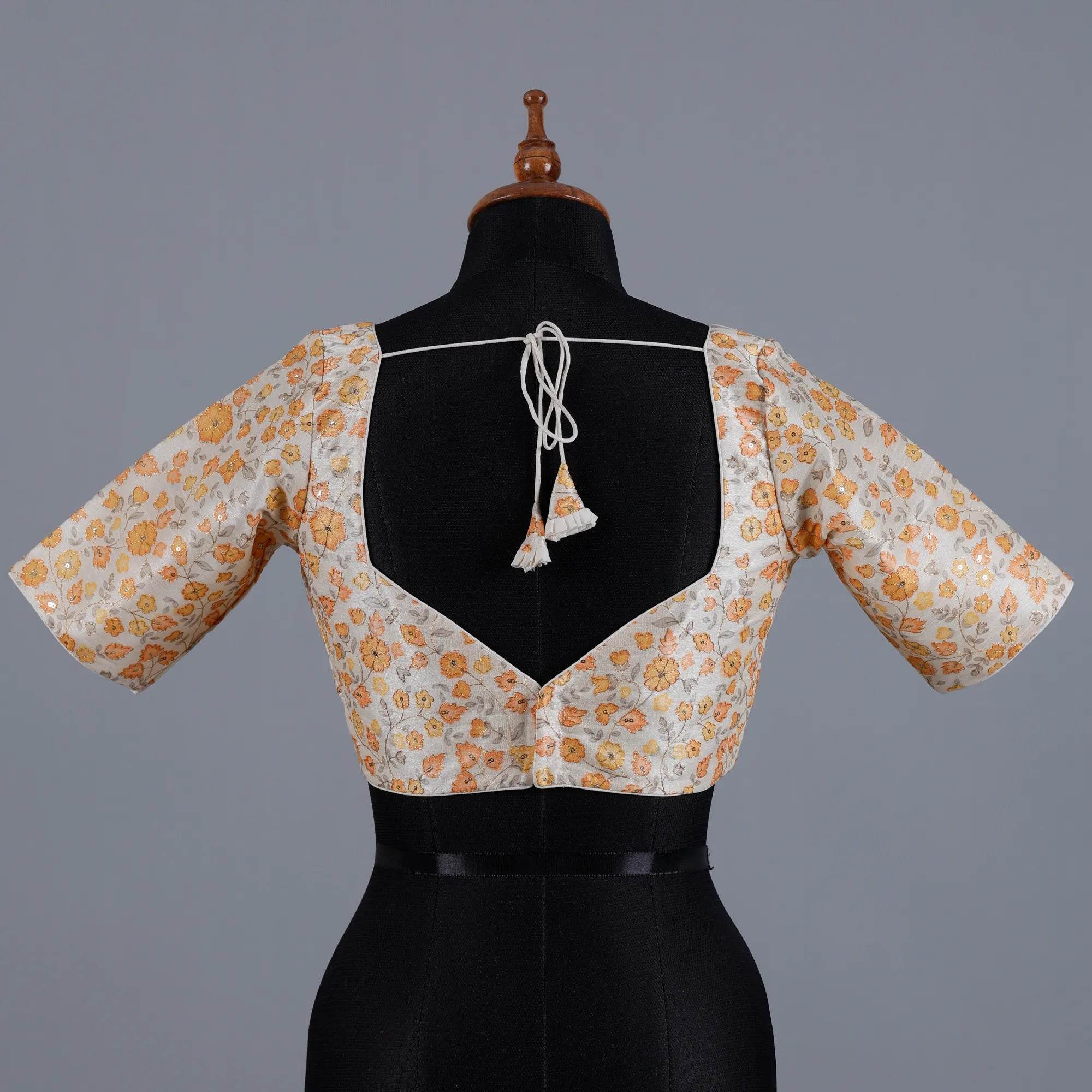 Offwhite Silk Blouse with Yellow print and Embroidery with Sweetheart Neck - Adi Akshoy & Co.