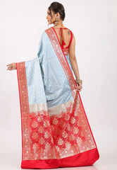 Sky Blue with Red Border Pastel Banarasi Saree With Blouse Piece - Adi Akshoy & Co.