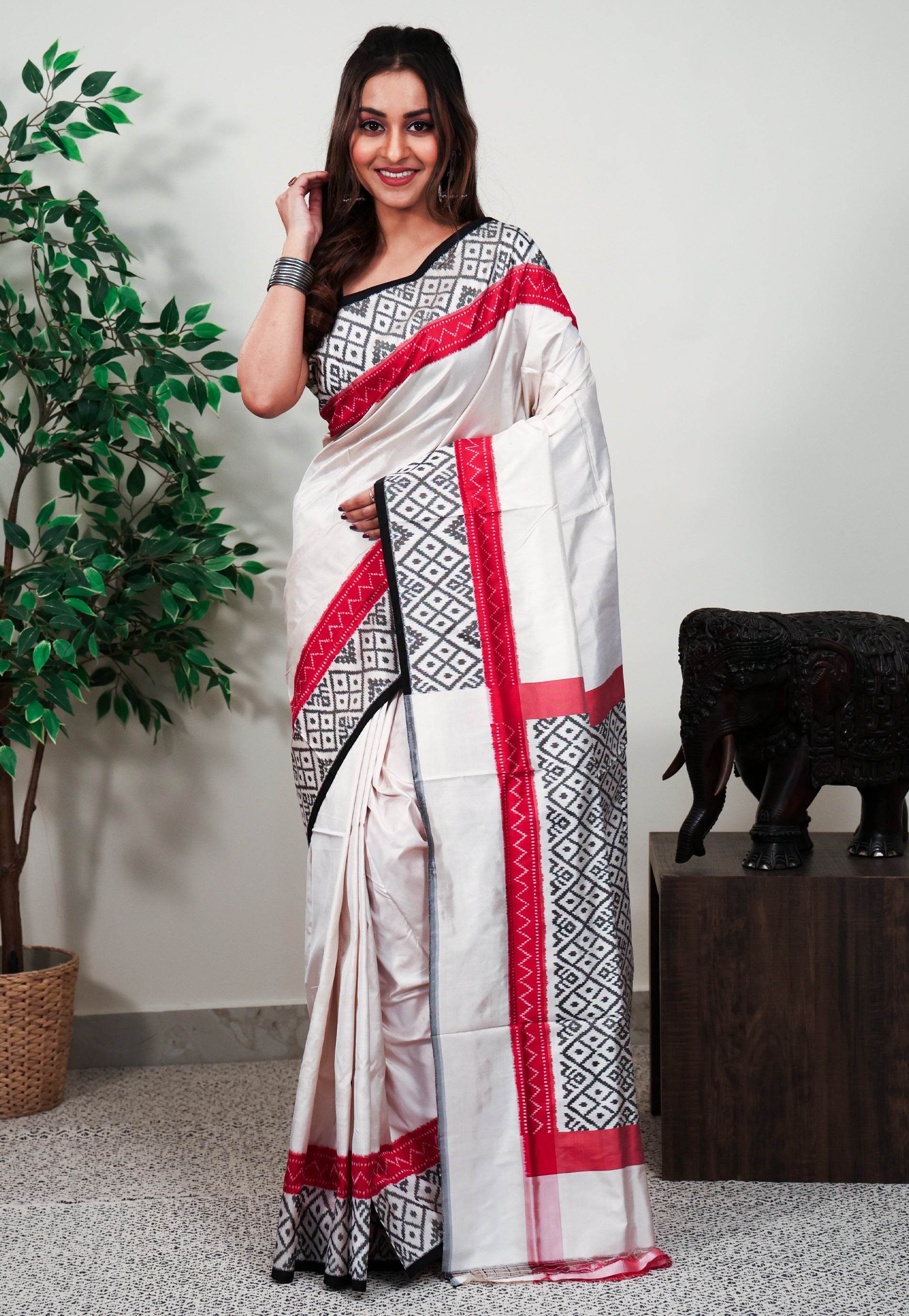 Off White base Ganga Jamuna Border (Red and Black) Ikkat Saree With Blouse Piece - Adi Akshoy & Co.