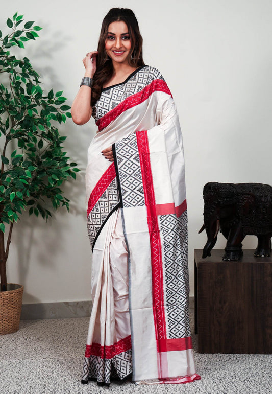 Off White base Ganga Jamuna Border (Red and Black) Ikkat Saree With Blouse Piece - Adi Akshoy & Co.