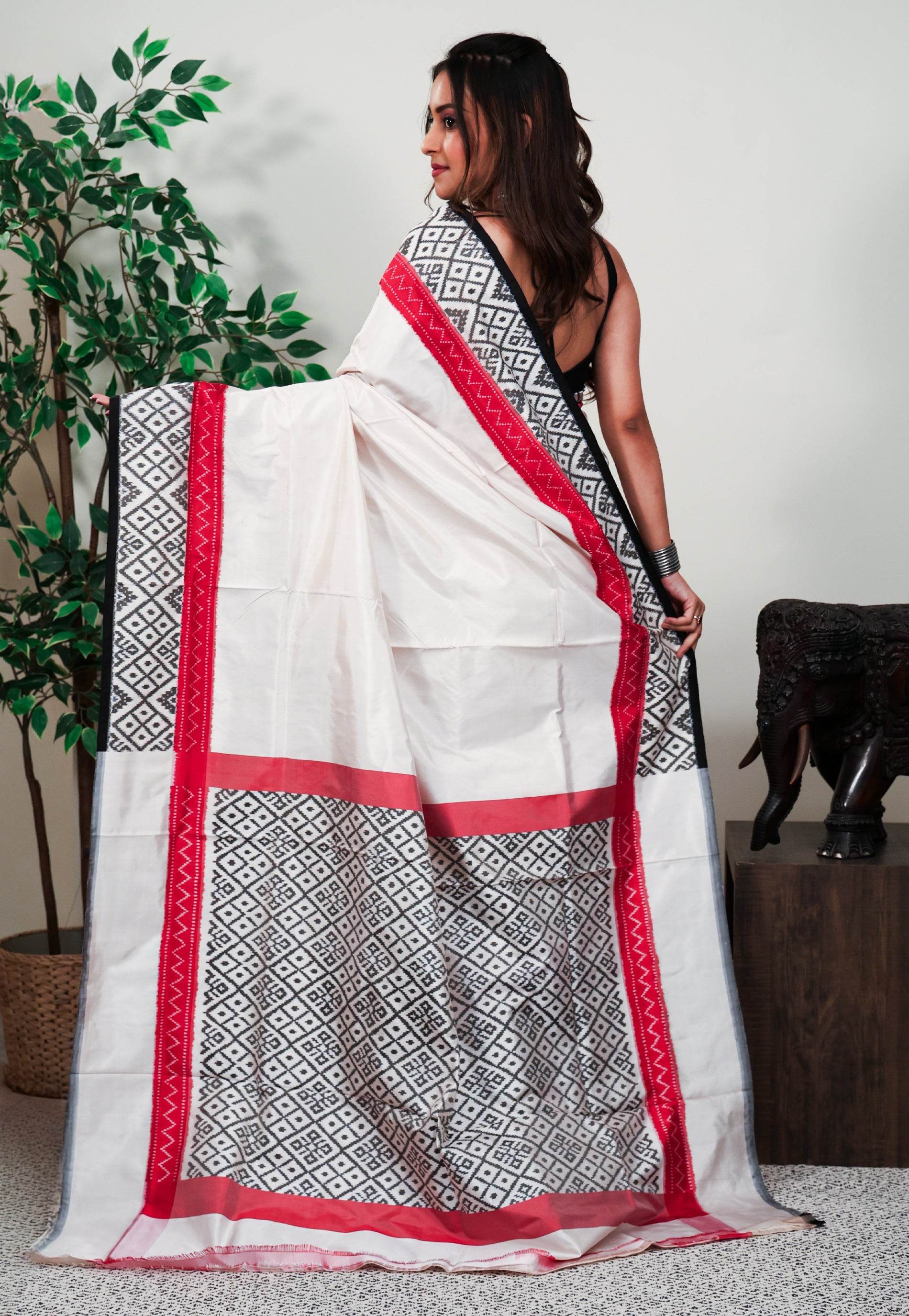 Off White base Ganga Jamuna Border (Red and Black) Ikkat Saree With Blouse Piece - Adi Akshoy & Co.