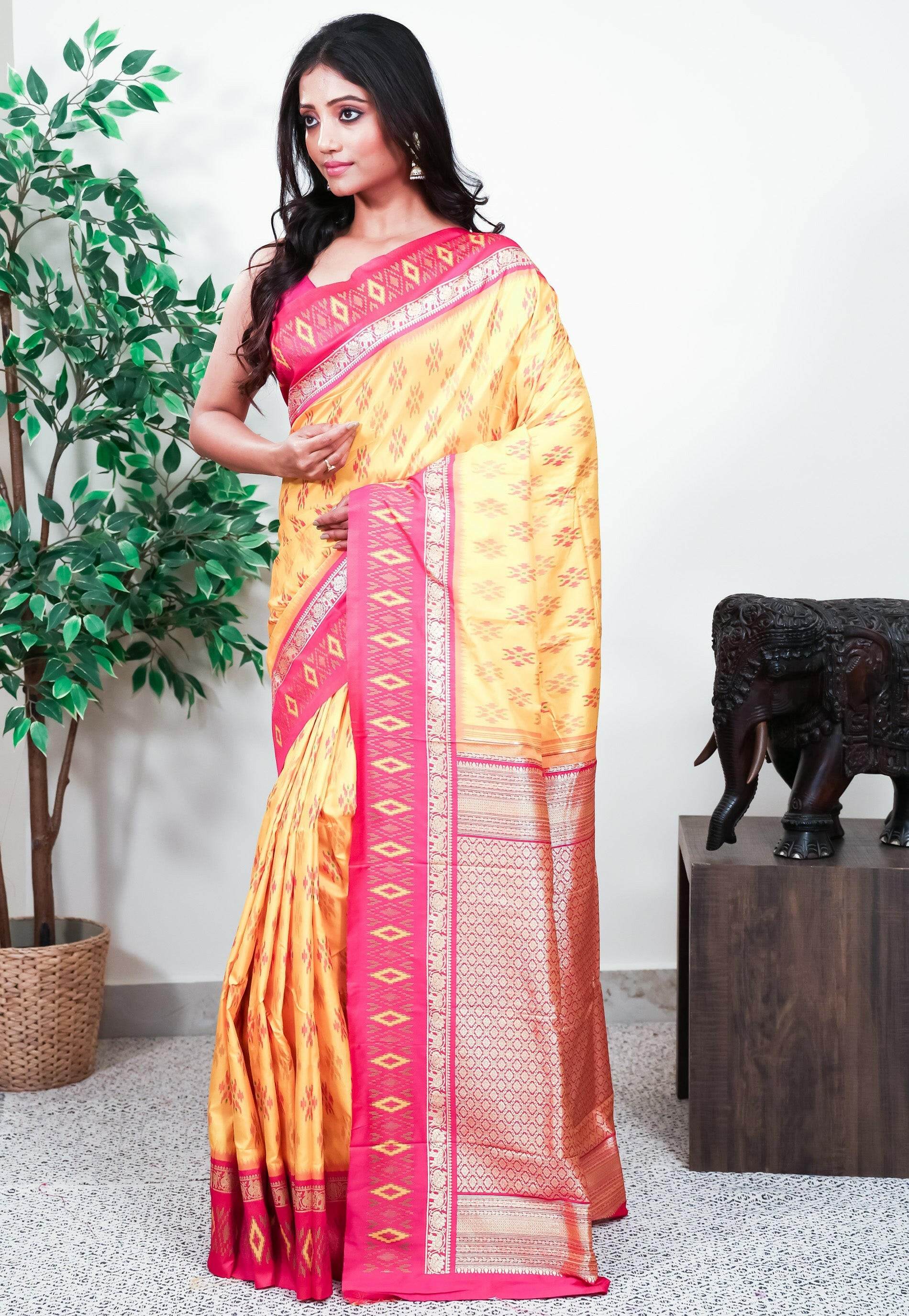 Yellow with Rani Pink Border Handloom Ikkat Saree With Blouse Piece - Adi Akshoy & Co.