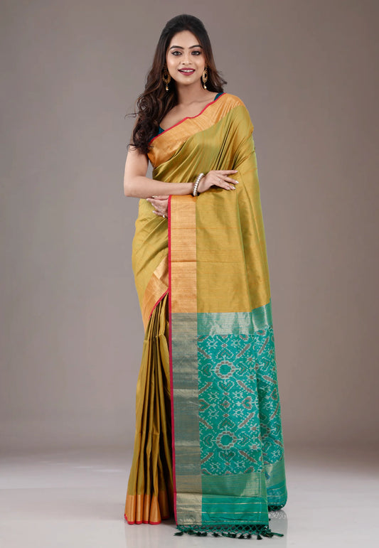 Cross Line Green Ikkat Silk Saree With Blouse Piece